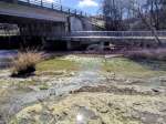 stream from culvert to bridge